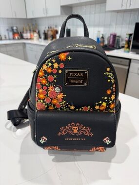 Loungefly Coco Leather Mini Backpack